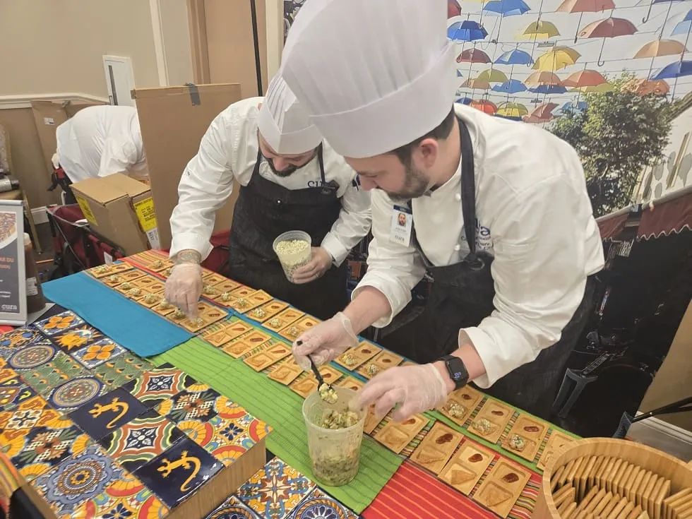two chefs preparing food