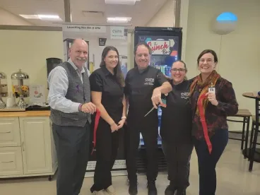 fcmc team cutting the ribbon