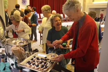 Residents at White House Village enjoy food prepared by Elior Living