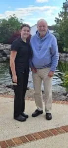 two people smiling for a picture