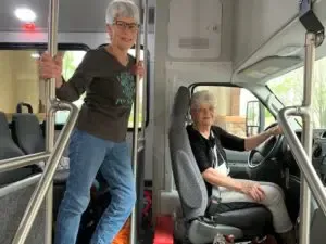 two women in a bus