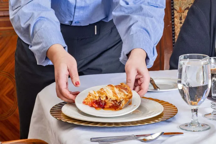 Server serving a slice of pie